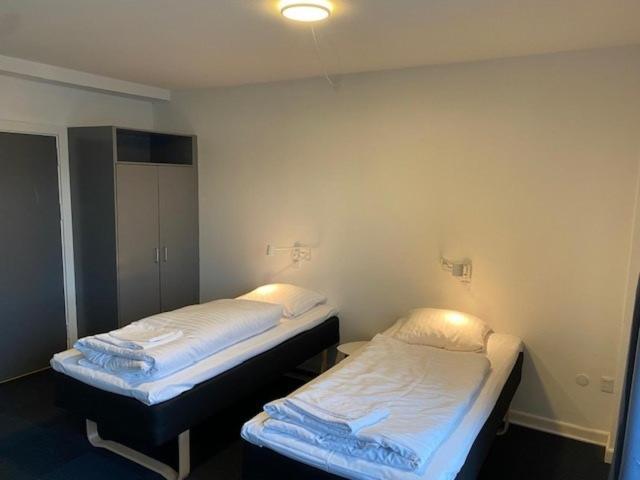 Postel nebo postele na pokoji v ubytování Hotel-B