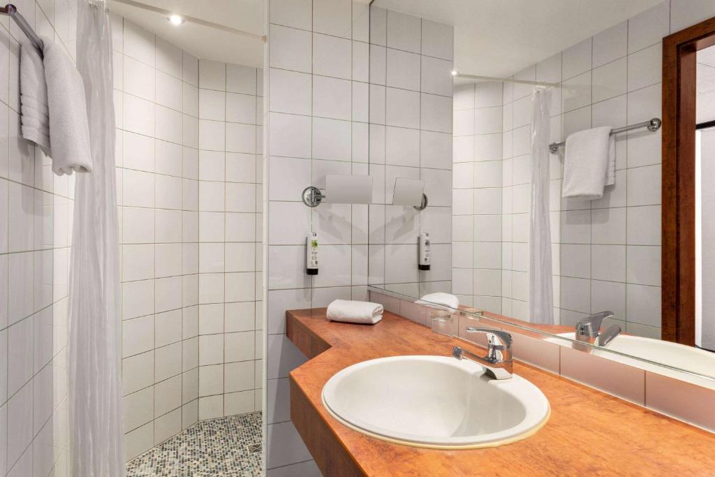 Koupelna v ubytování Amedia Frankfurt Russelsheim Trademark Collection by Wyndham