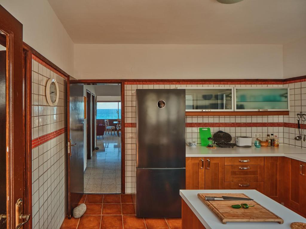 Kuchyň nebo kuchyňský kout v ubytování Playa Marina Eco Beach Villa