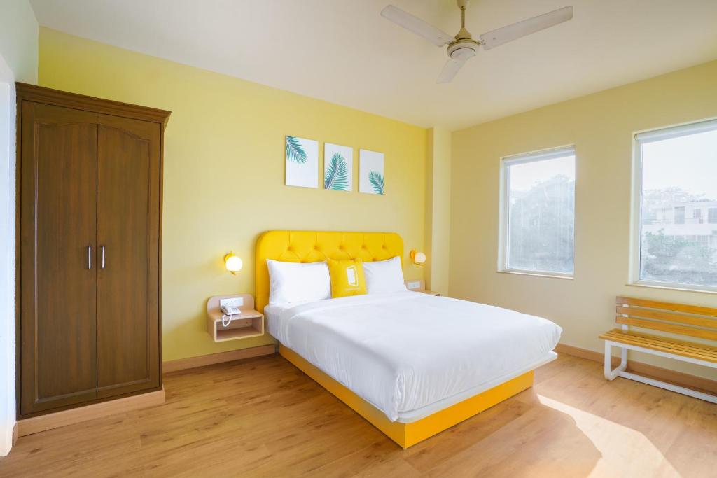 Postel nebo postele na pokoji v ubytování Bloom Hotel - GK2
