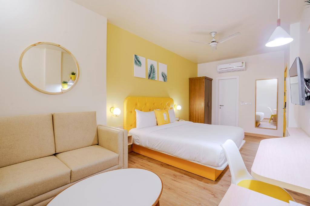 Postel nebo postele na pokoji v ubytování Bloom Hotel - GK2
