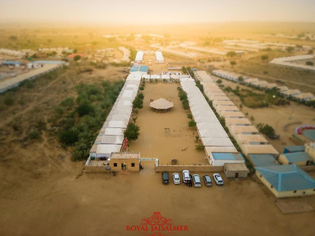 an aerial view of a compound with tents and cars at Royal Jaisalmer Resort with Swimming Pool in Jaisalmer