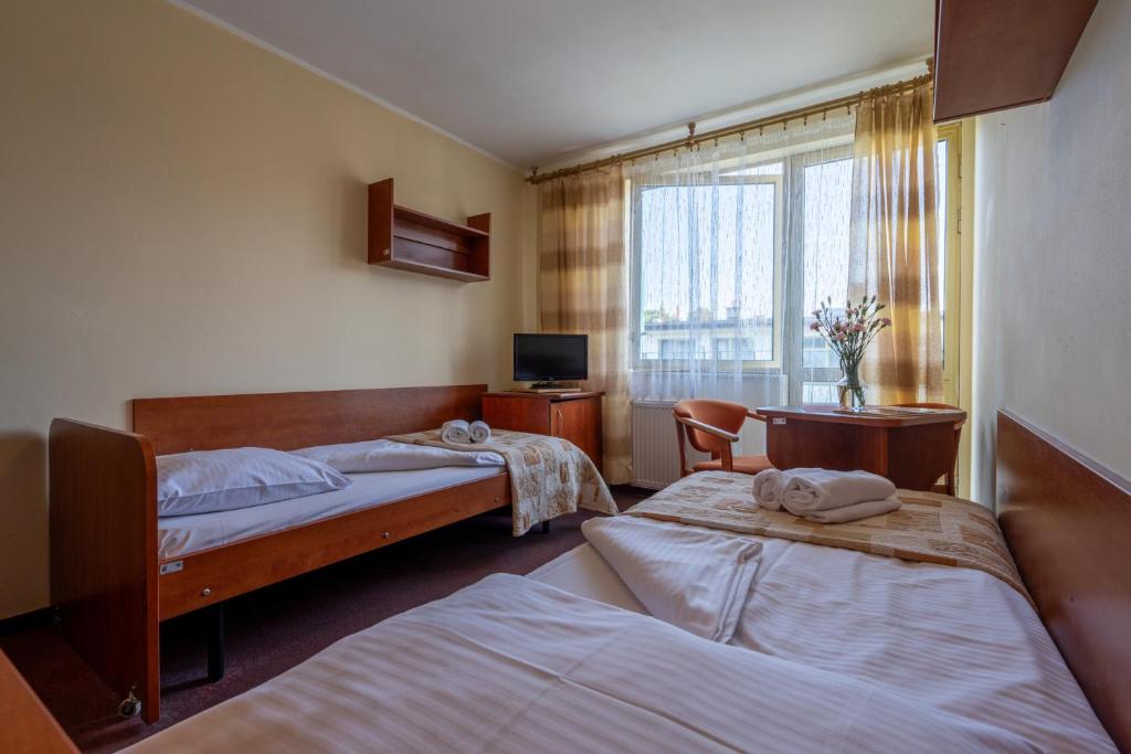 Postel nebo postele na pokoji v ubytování OW Carbo Dąbki - w sąsiedztwie lasu i jeziora