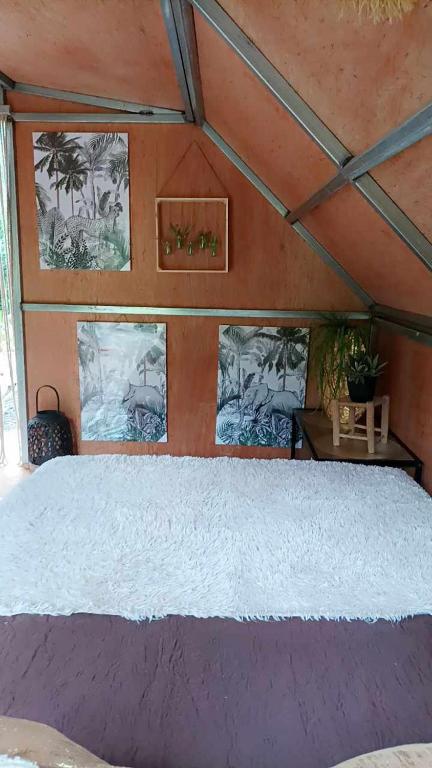 Postel nebo postele na pokoji v ubytování CAMPING le fruit de la passion