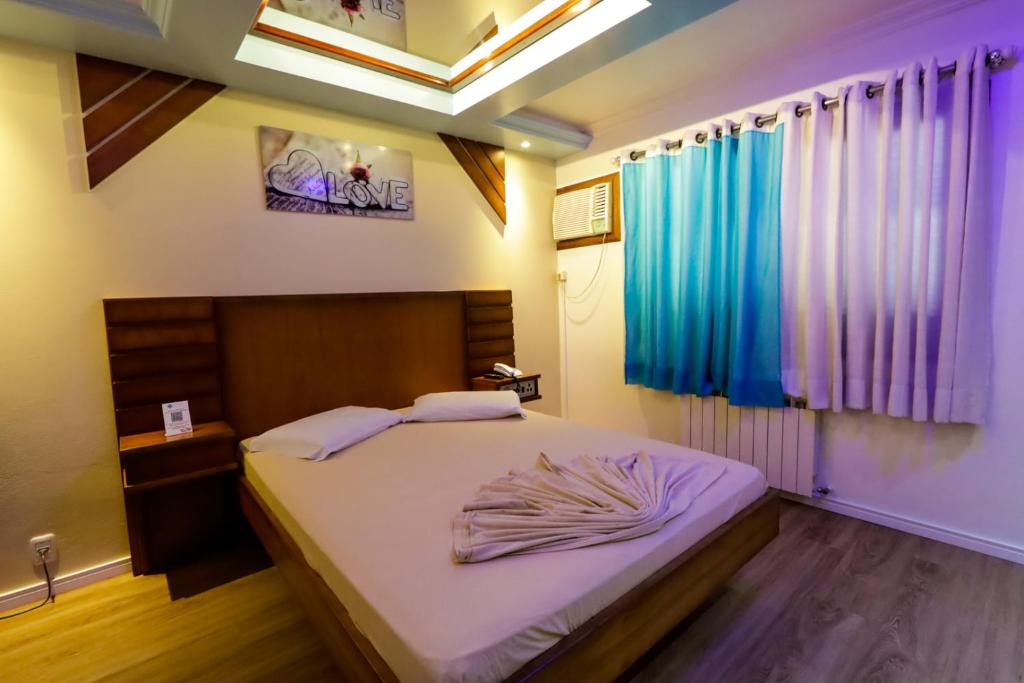 Postel nebo postele na pokoji v ubytování Motel Avenida (Adult Only)