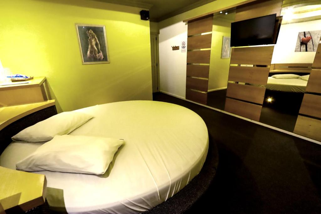 Postel nebo postele na pokoji v ubytování Motel Avenida (Adult Only)