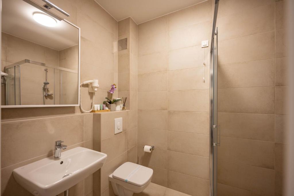 Koupelna v ubytování Hotel Magdalena
