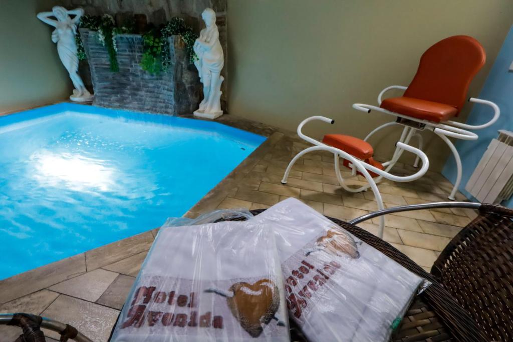 Bazén v ubytování Motel Avenida (Adult Only) nebo v jeho okolí