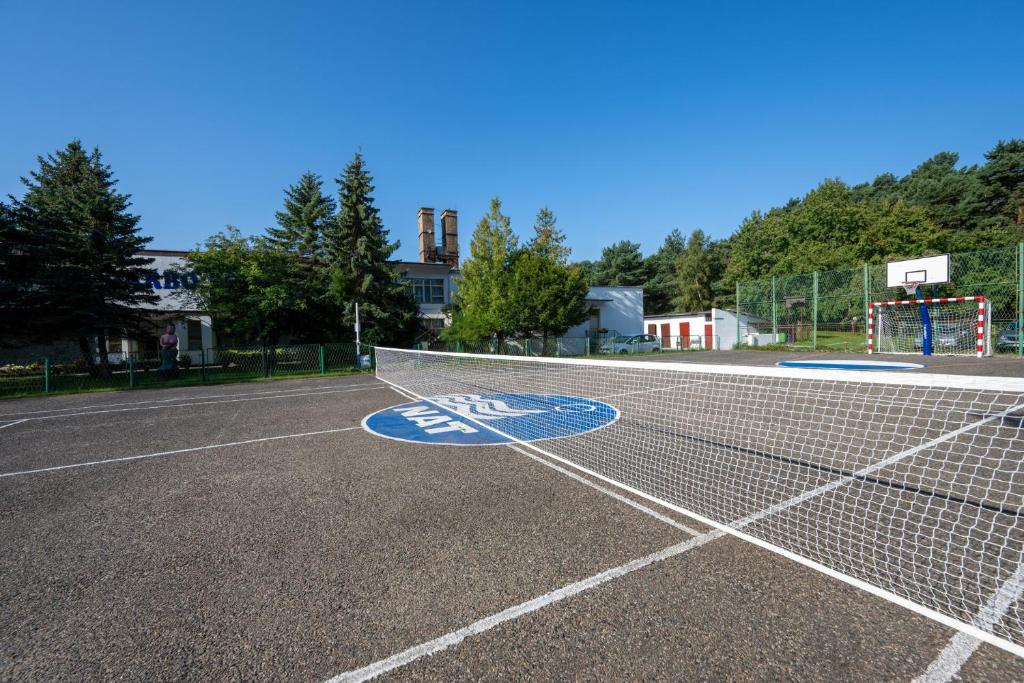 Tenis a/nebo squash v ubytování OW Carbo Dąbki - w sąsiedztwie lasu i jeziora nebo okolí