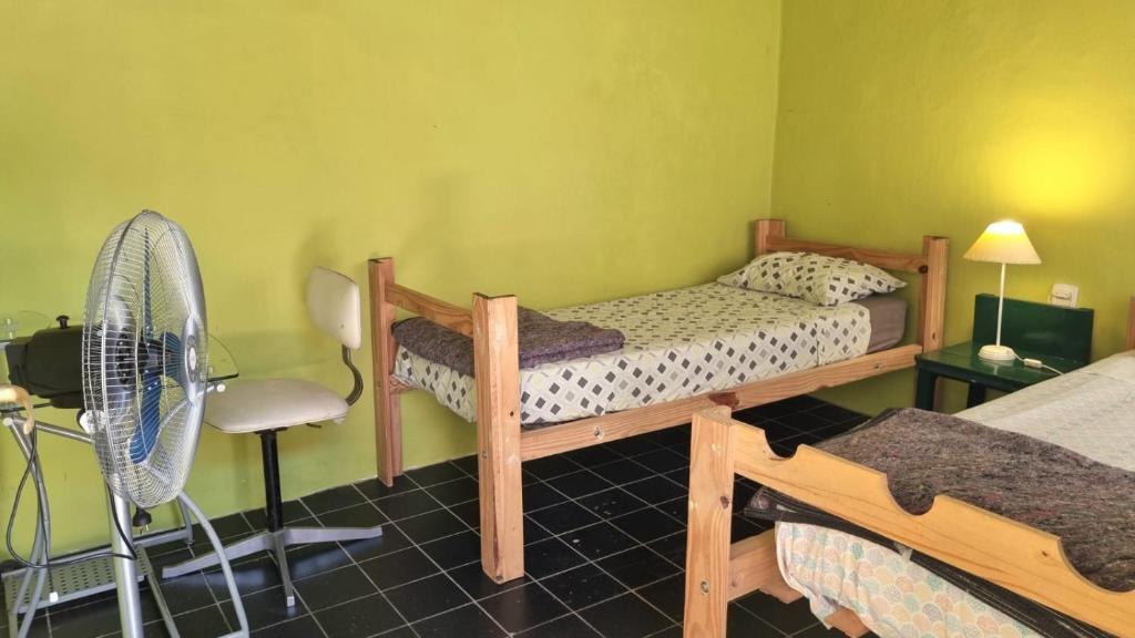 Postel nebo postele na pokoji v ubytování Hostel - Sueños del Rio