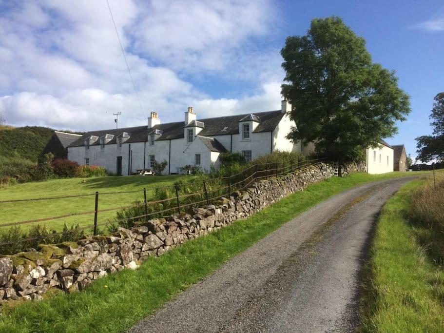 a house on the side of a road at Ardnadrochet Cottage in Lochdon