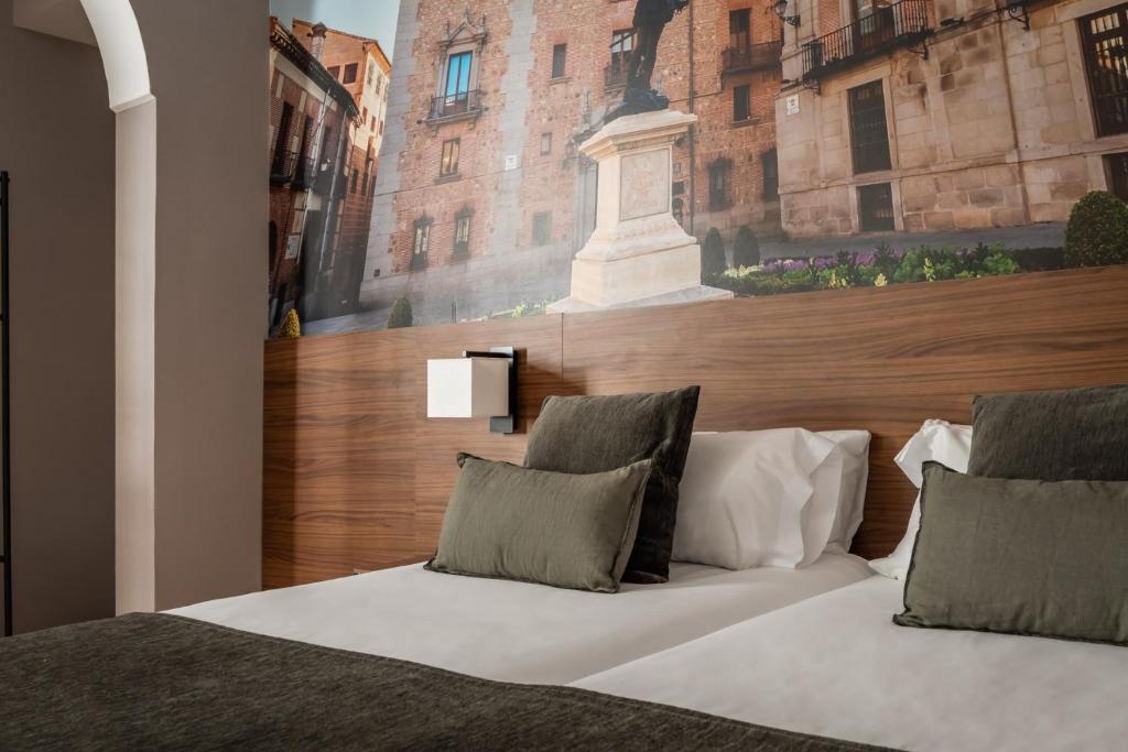 A bed or beds in a room at BYPILLOW The Citadel