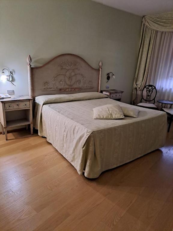 Postel nebo postele na pokoji v ubytování Hotel Internazionale