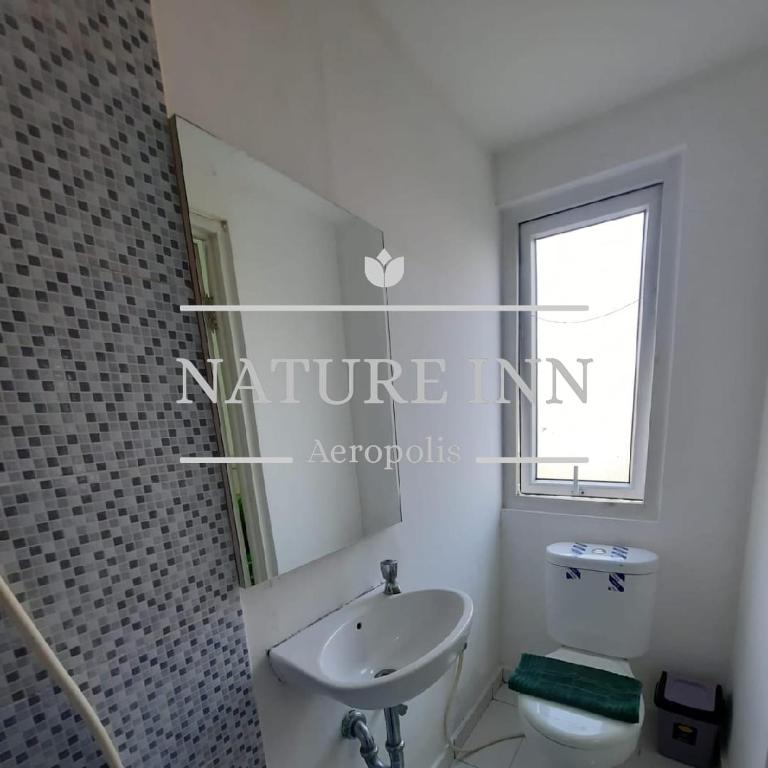 タンゲランにあるNATURE INN Aeropolis AR3のギャラリーの写真