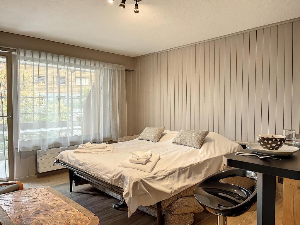 Postel nebo postele na pokoji v ubytování Apartment Cimerose 2