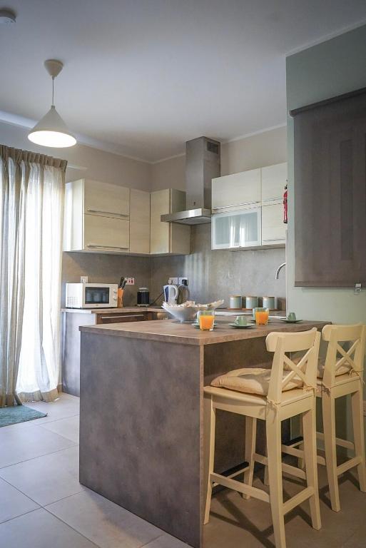 Kuchyň nebo kuchyňský kout v ubytování Comfort and Convenience flat 4 dad's court