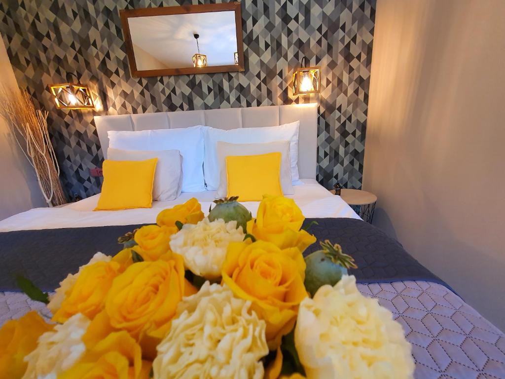 Postel nebo postele na pokoji v ubytování Resort Lesní Lázně