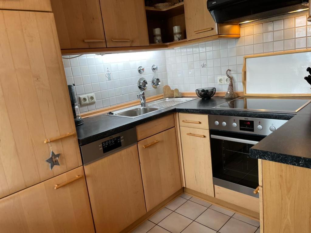 Kuchyň nebo kuchyňský kout v ubytování Ferienwohnung Ambiente