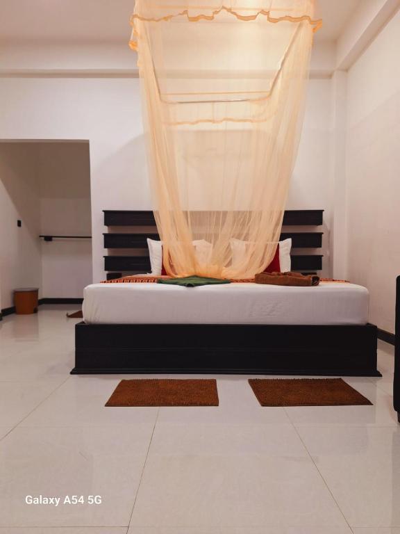 Postel nebo postele na pokoji v ubytování Ella Odyssey Inn