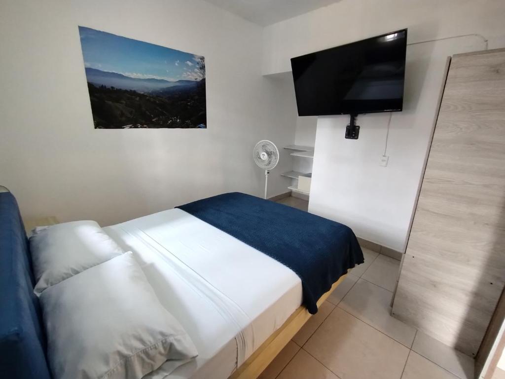 Postel nebo postele na pokoji v ubytování Air Guest House