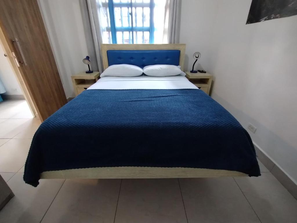 Postel nebo postele na pokoji v ubytování Air Guest House