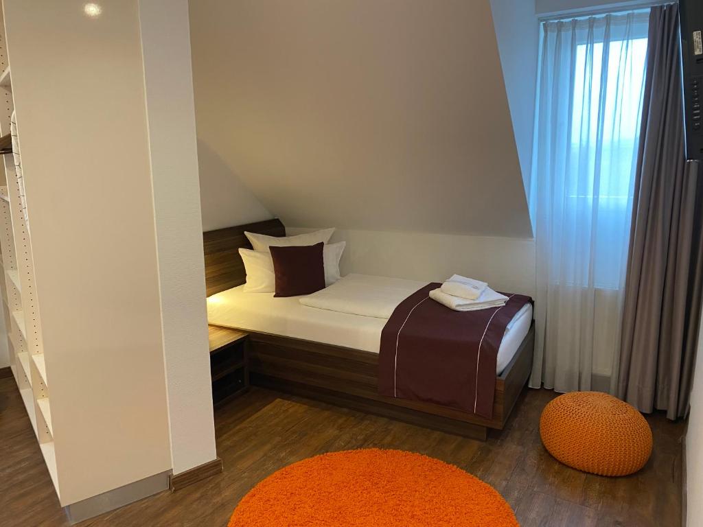 Voodi või voodid majutusasutuse sevenDays Hotel Karlsruhe toas