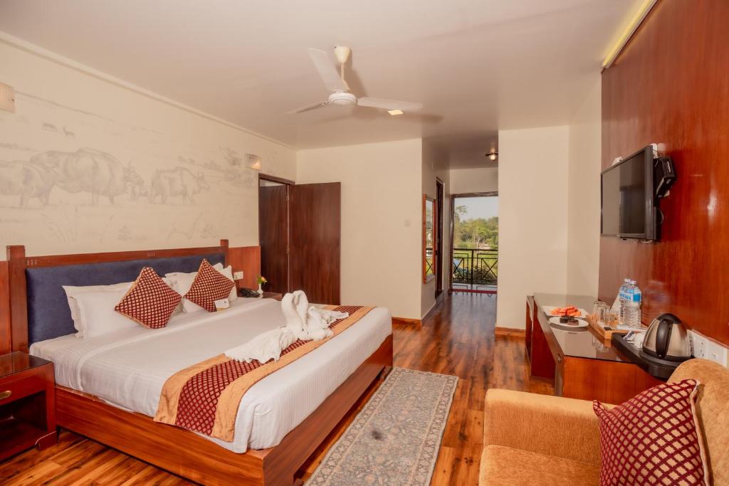 Postel nebo postele na pokoji v ubytování Hotel Jungle Crown