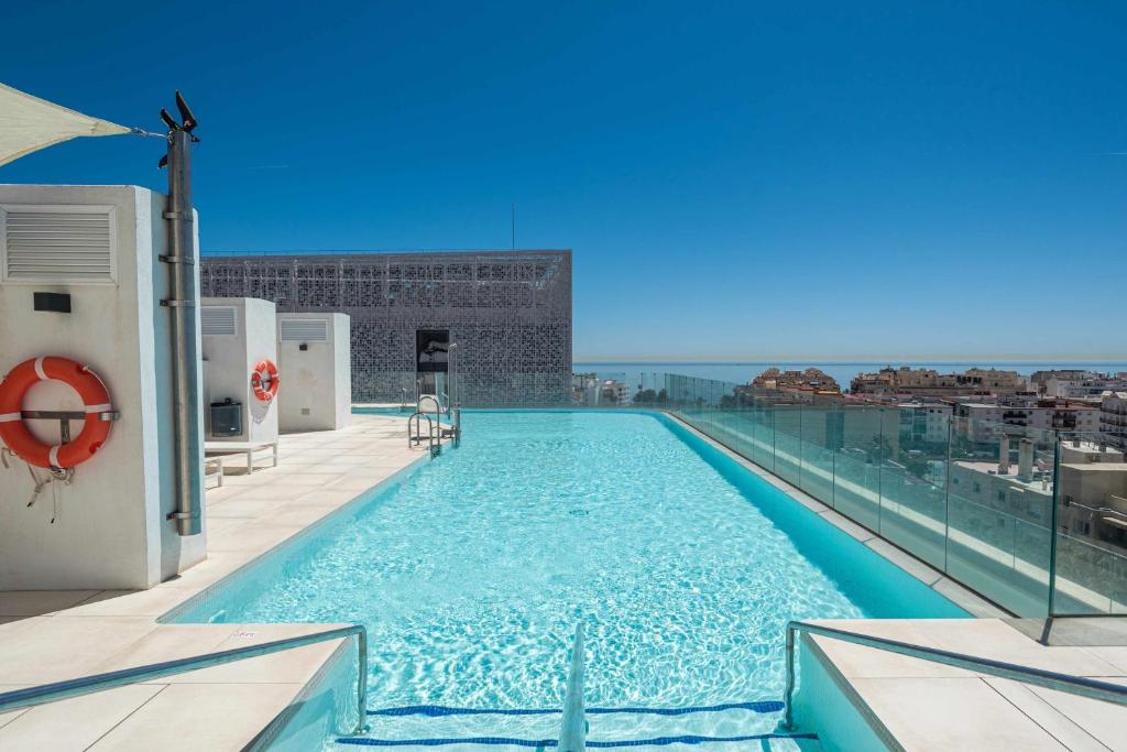a swimming pool on the roof of a building at Selecta Estepona Roof Top Pool 3 in Estepona