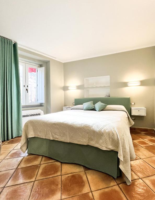 Ένα ή περισσότερα κρεβάτια σε δωμάτιο στο Residenza Ucci Ali - XS