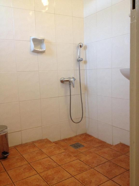 Koupelna v ubytování Aegli Hotel