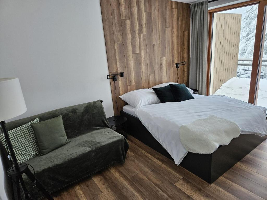 Postel nebo postele na pokoji v ubytování Apartmán Kľak