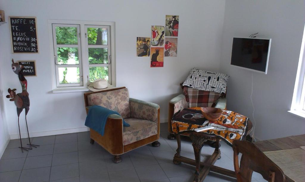 TV a/nebo společenská místnost v ubytování Vranum Guesthouse