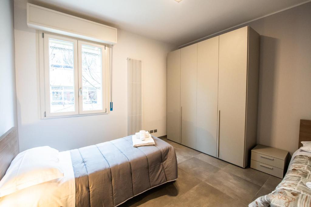 Postel nebo postele na pokoji v ubytování Ospedale a 350m Centro a 900m l Matrimoniali con Bagno Privato l Parcheggio Self Check