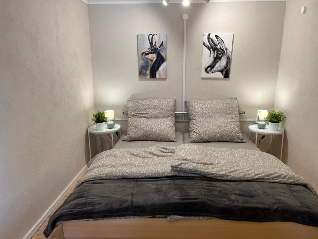 Postel nebo postele na pokoji v ubytování Beim Patzelt - Ferienhaus in Nesselwang