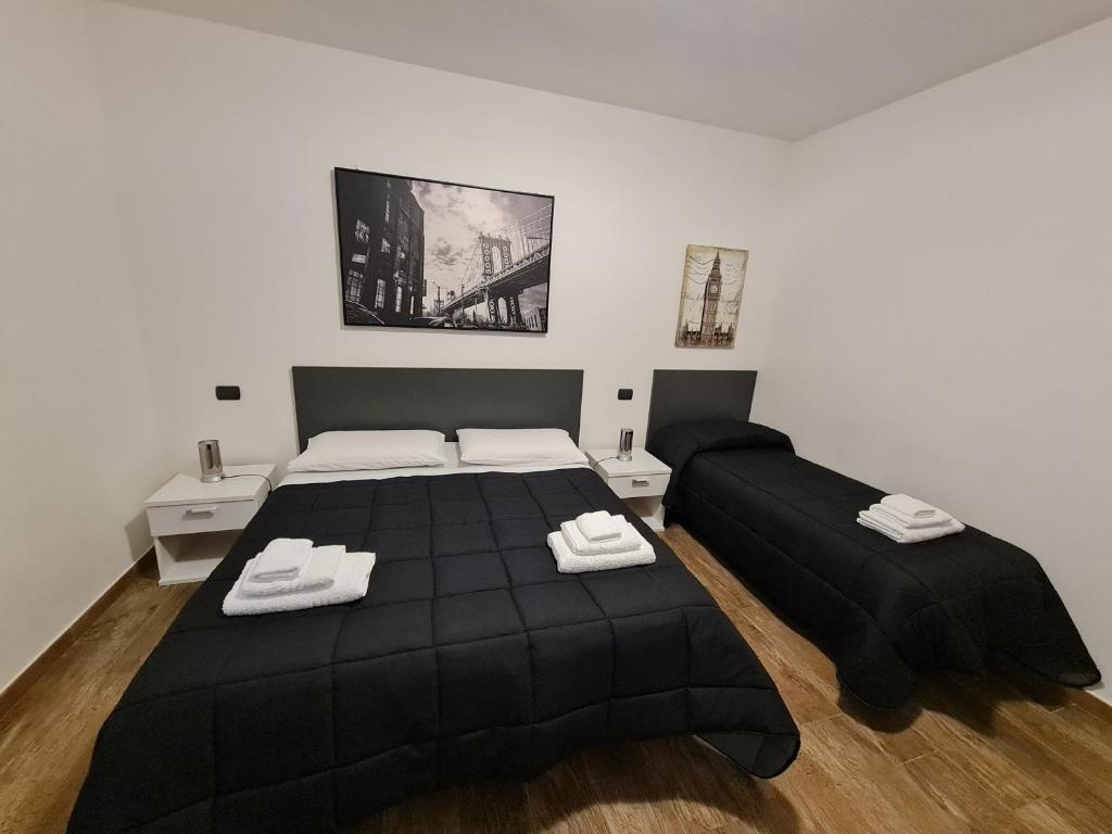 Postel nebo postele na pokoji v ubytování Monti Guest House Alghero