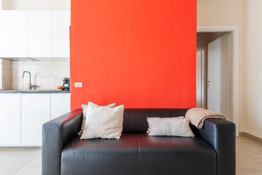A seating area at Conchetta Flexyrent - Aircon - WiFi - Navigli