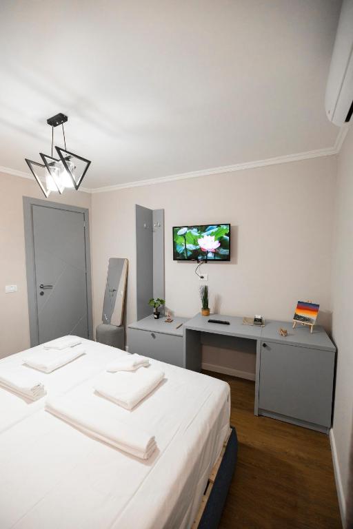 Postel nebo postele na pokoji v ubytování Tier Hotel