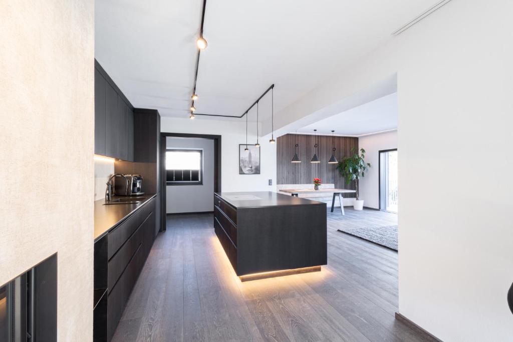 Kuchyň nebo kuchyňský kout v ubytování Penthouse Julia nähe Badesee mit Infrarotsauna -Zell am See Kaprun