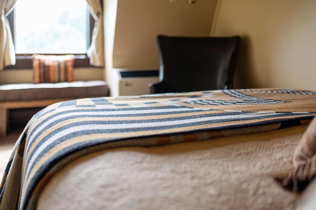 Postel nebo postele na pokoji v ubytování Sheridan Inn - Best Western Signature Collection