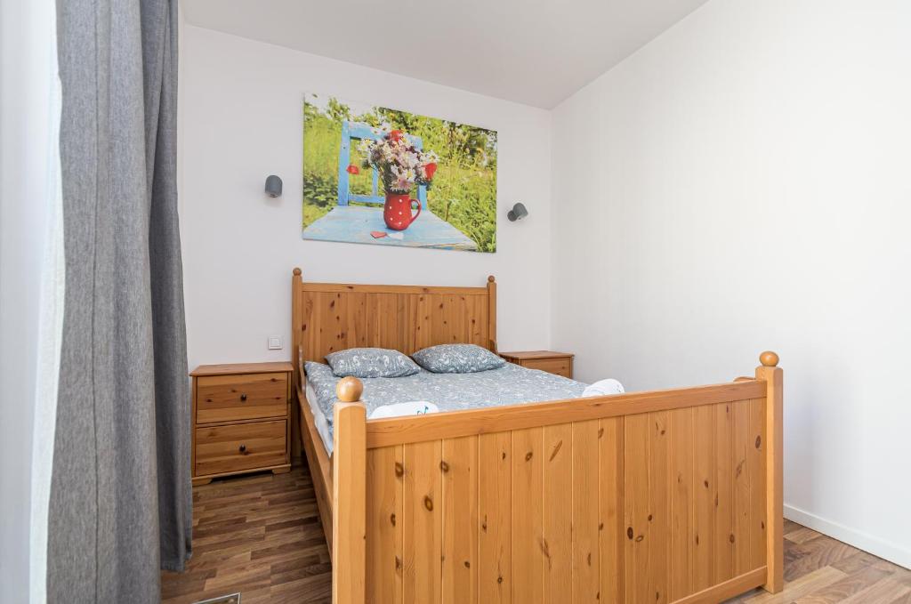 Posteľ alebo postele v izbe v ubytovaní Landmark Apartments