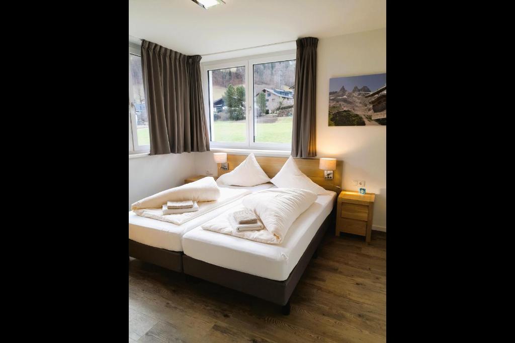 Кровать или кровати в номере Drei Türme Top 5