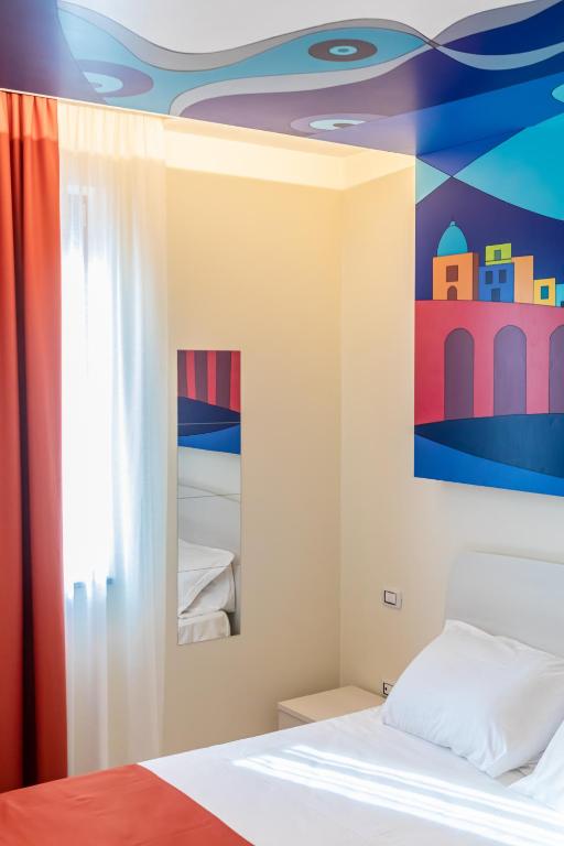 Postel nebo postele na pokoji v ubytování HAPPYROOMS