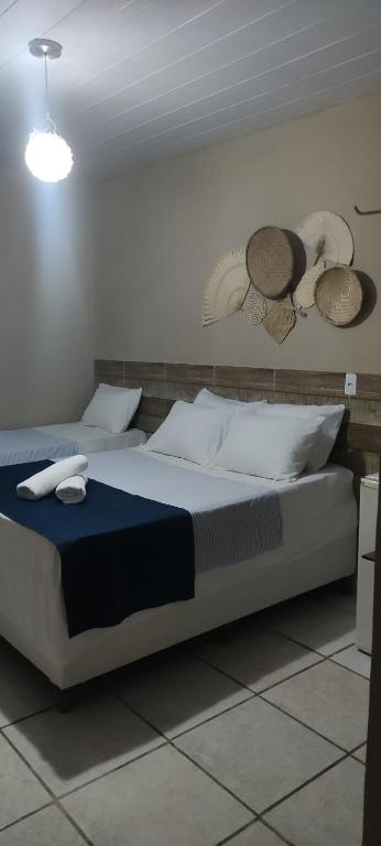Cama ou camas em um quarto em Pousada Nordestina