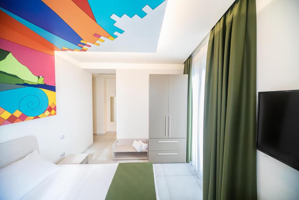 Postel nebo postele na pokoji v ubytování HAPPYROOMS