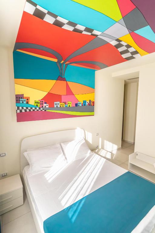 Postel nebo postele na pokoji v ubytování HAPPYROOMS