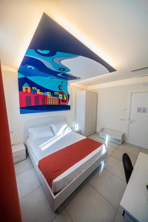Postel nebo postele na pokoji v ubytování HAPPYROOMS