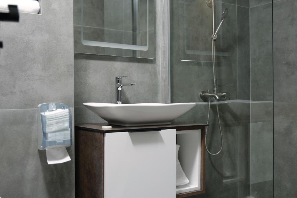 Koupelna v ubytování Vetus Hotel