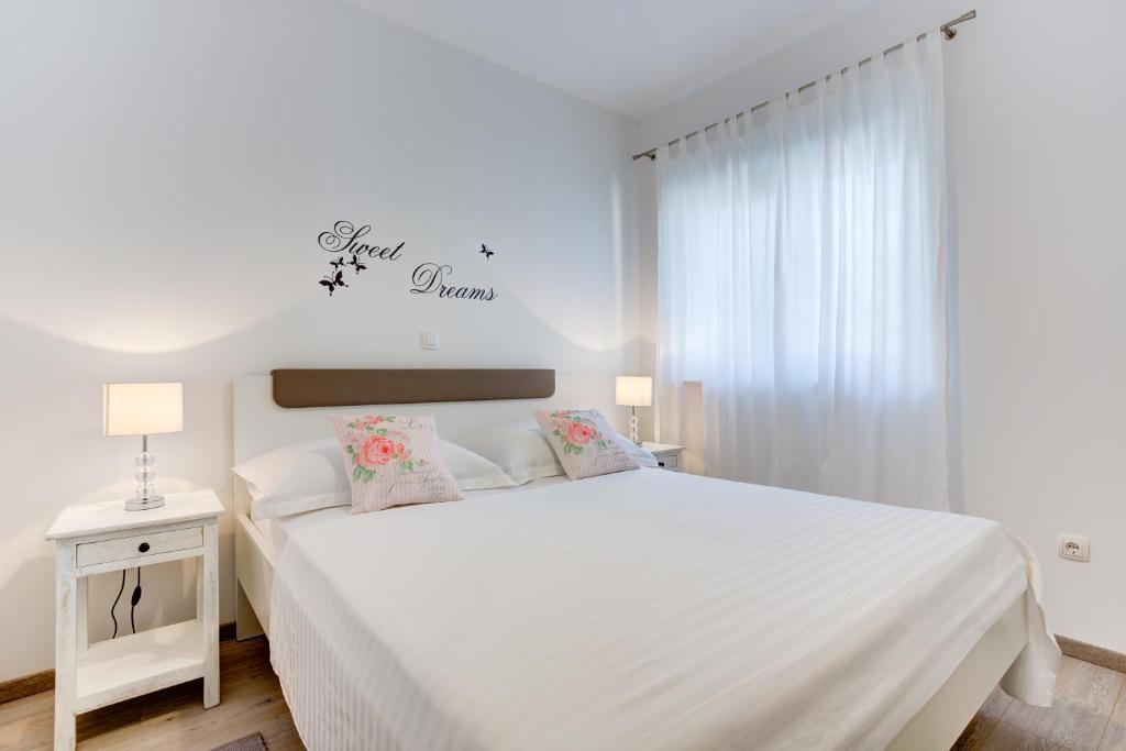Posteľ alebo postele v izbe v ubytovaní Apartment Melki