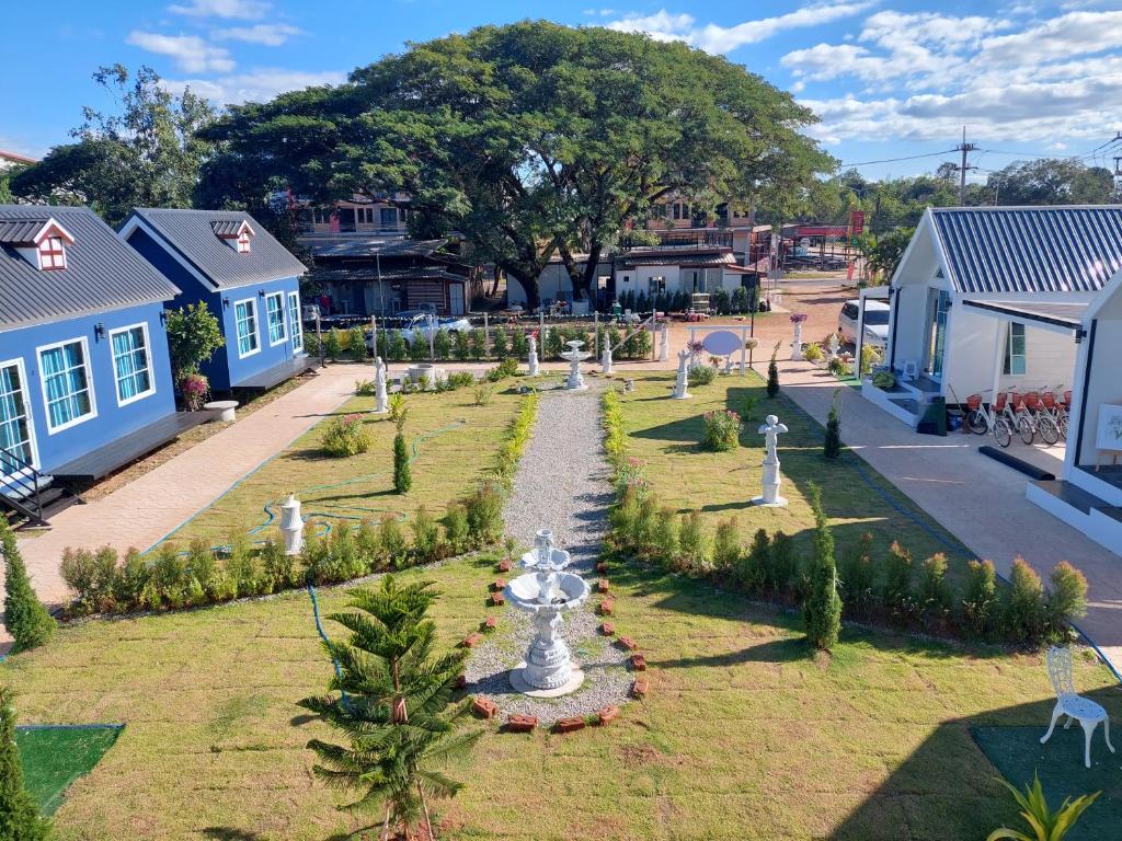 an aerial view of a garden with a fountain at Raintrary House in Nakhon Phanom