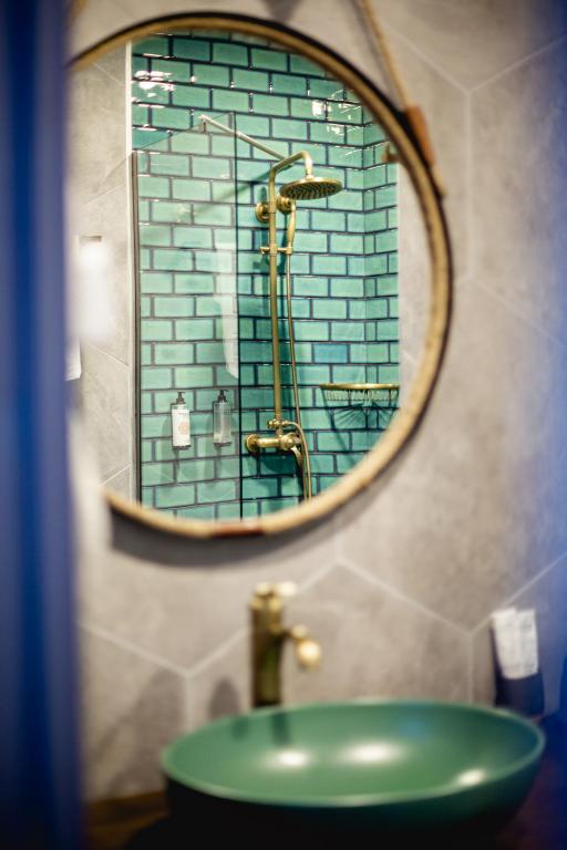 Koupelna v ubytování Hotel Roshe Gudauri